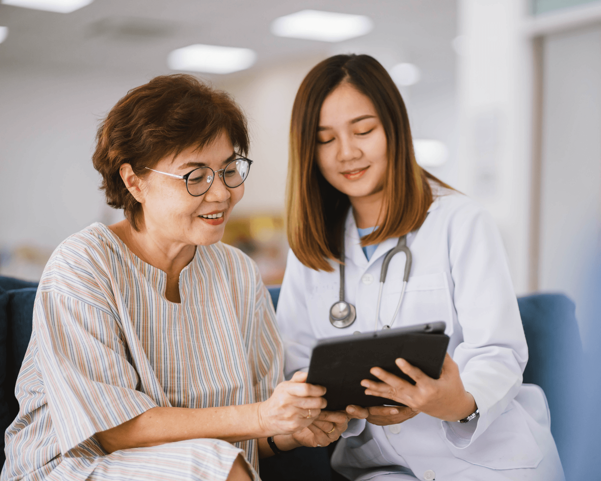 Filipino patients and clinicians connecting through a BayanHealth consultation.